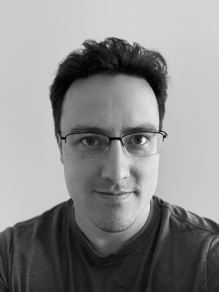 Joseph, founder of KudoKids — black-and-white portrait